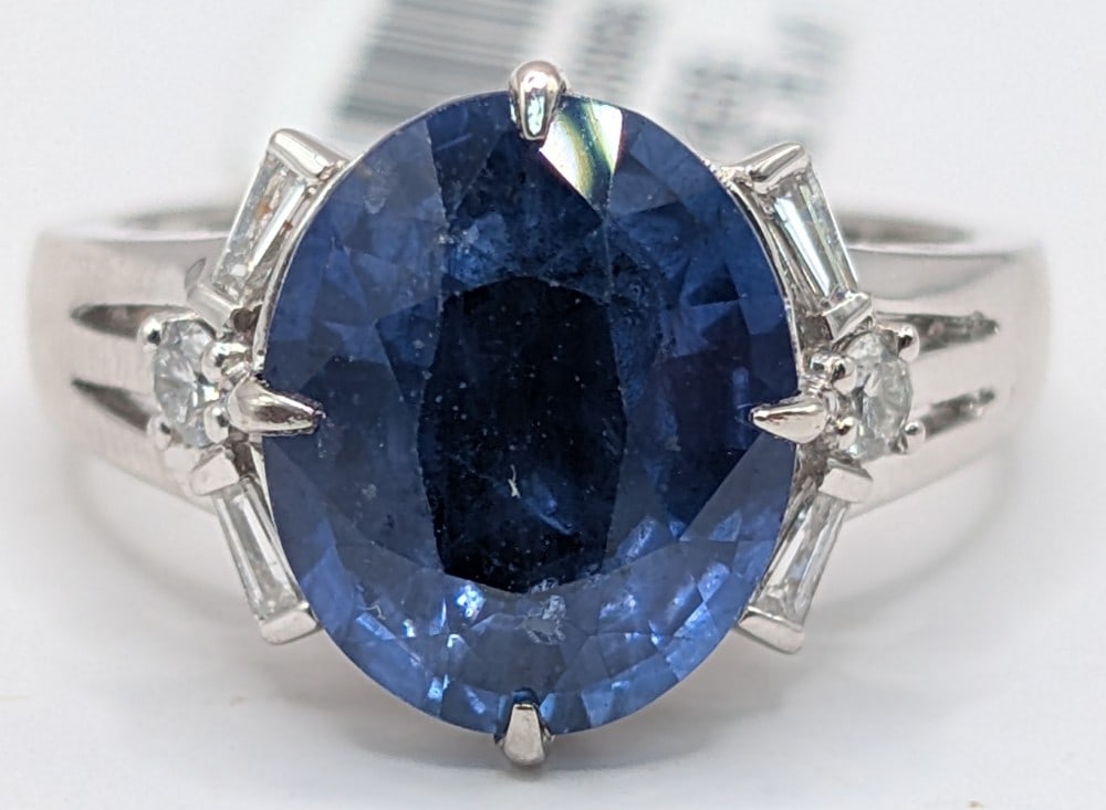 Platinum Oscar Friedman Ceylon Sapphire & Diamond Ring: Platinum designer Oscar Friedman ring with 5.41 CT rare Ceylon Sapphire and (6) baguette & round cut diamonds totaling 0.24 CTS. Ring is size 7 and weighs 9 grams. Ring comes with an AIGL appraisal