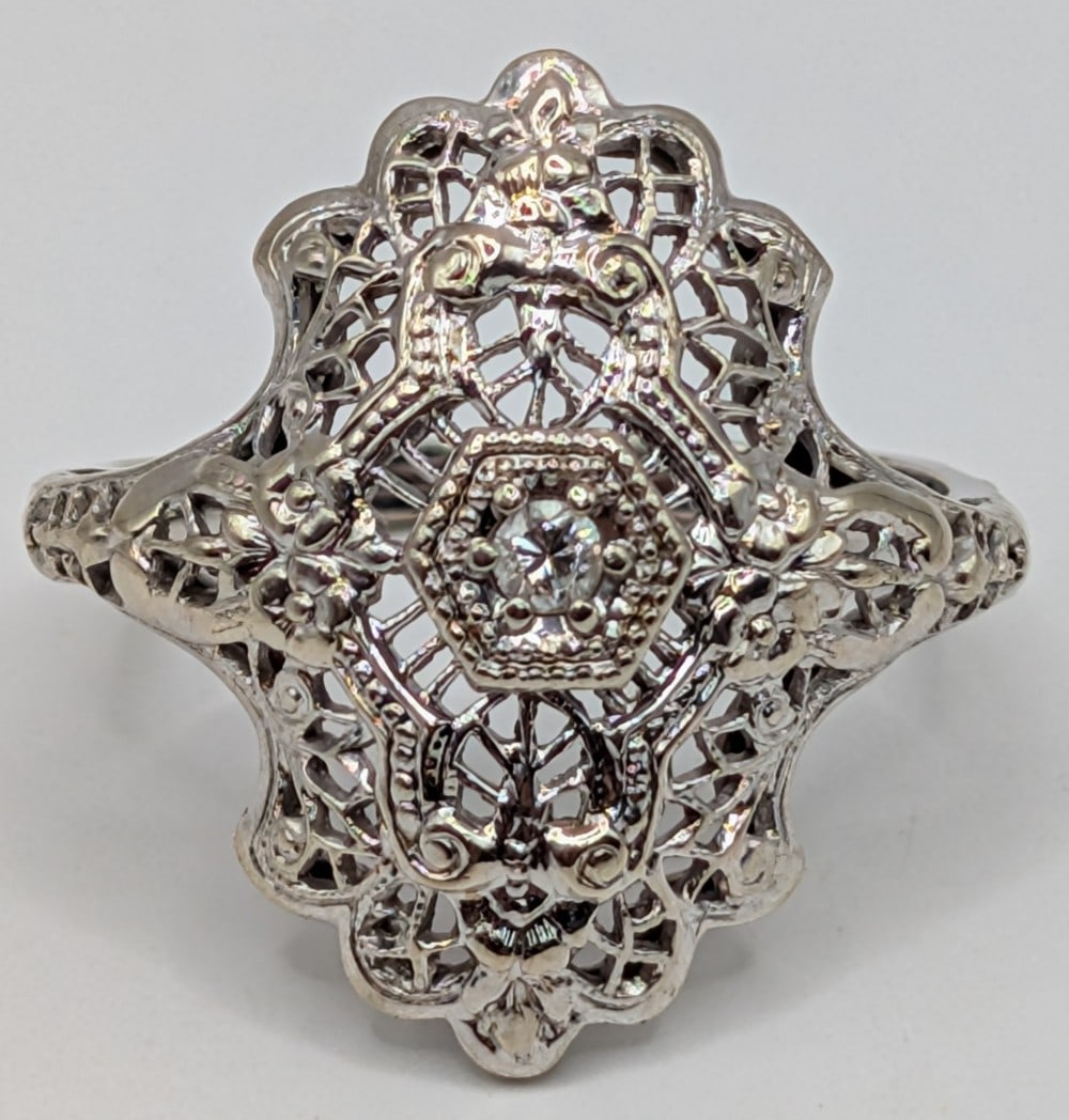 14K White Gold Art Deco Filigree Diamond Ring: 14K white gold art deco style filigree ring with diamond. Ring is size 6.5 and weighs 2.8 grams.