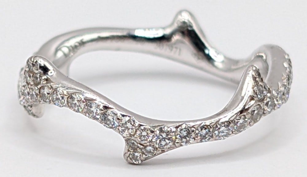 18K Christian Dior Bois De Rose Diamond Ring: 18K white gold Christian Dior diamond ring from the Bois De Rose collection. Approx .58 ctw diamonds. Ring is size 6 and weighs 2.8 grams. Serial number 307971.