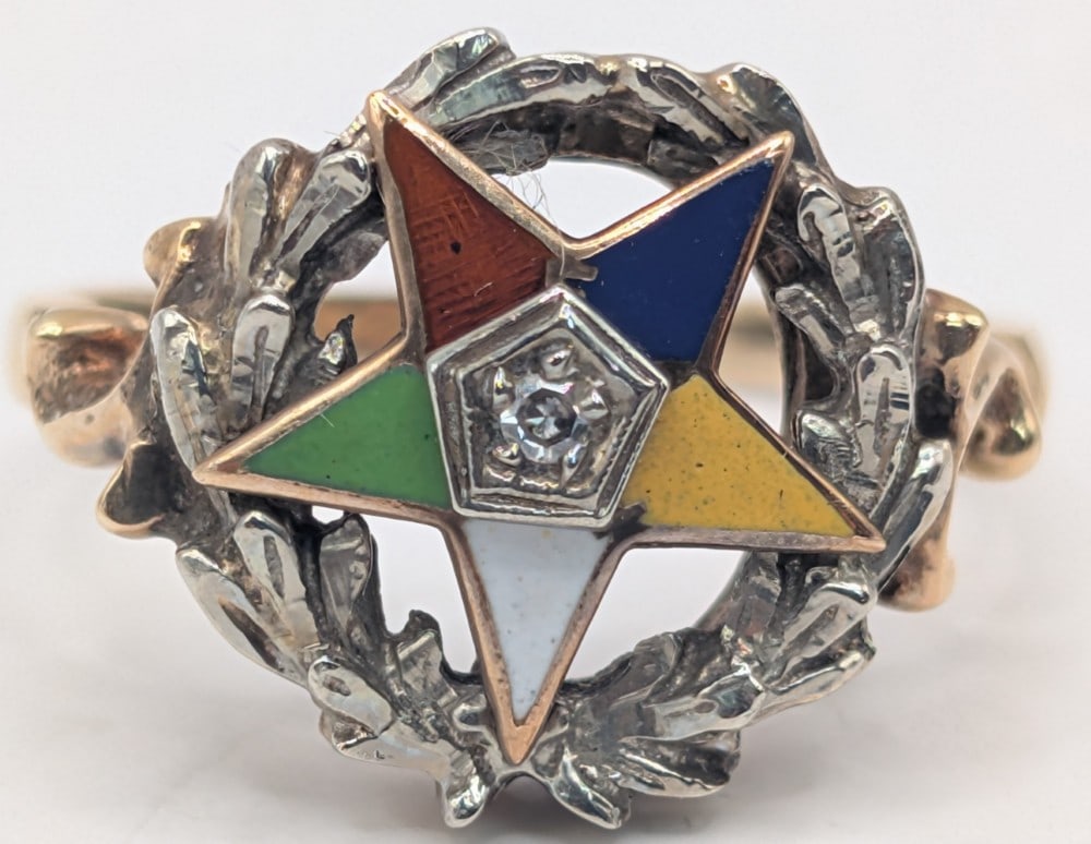 10K Gold 1920's Eastern Star Ring: 1920's 10K yellow gold eastern star ring. Ring has small diamond in center of enamel star. Ring is size 8 and weighs 4.3 grams.