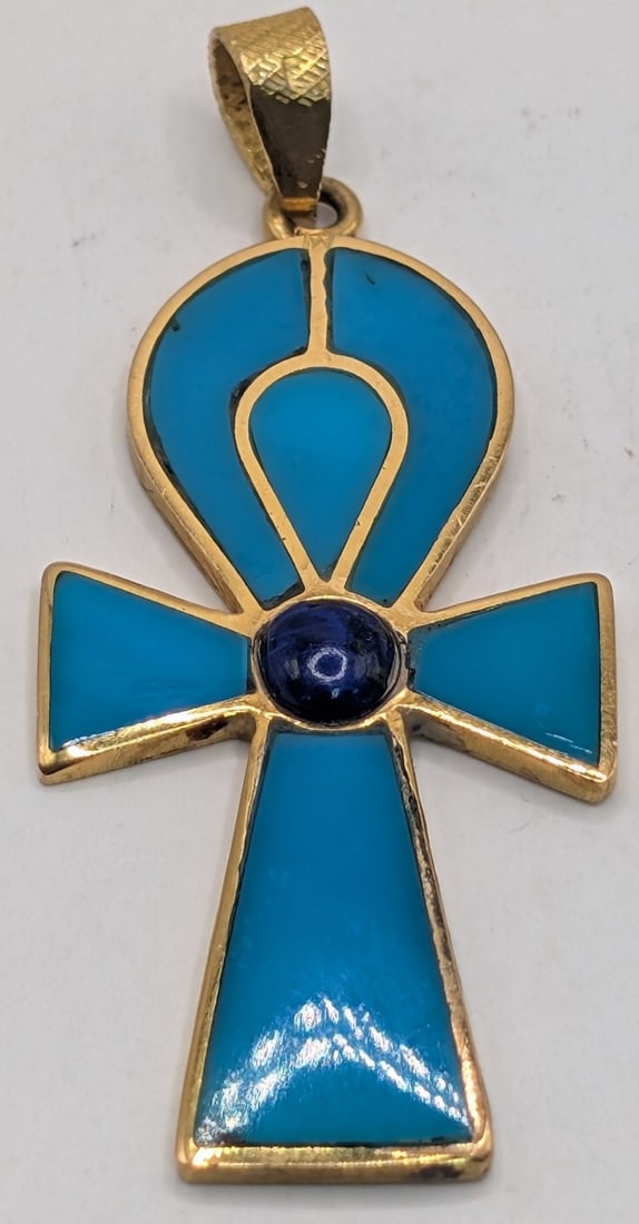 22K Gold Egyptian Ankh "Sign of life" Pendant: 22K yellow gold Egyptian Ankh pendant. Measures 1.75" and weighs 5.3 grams.