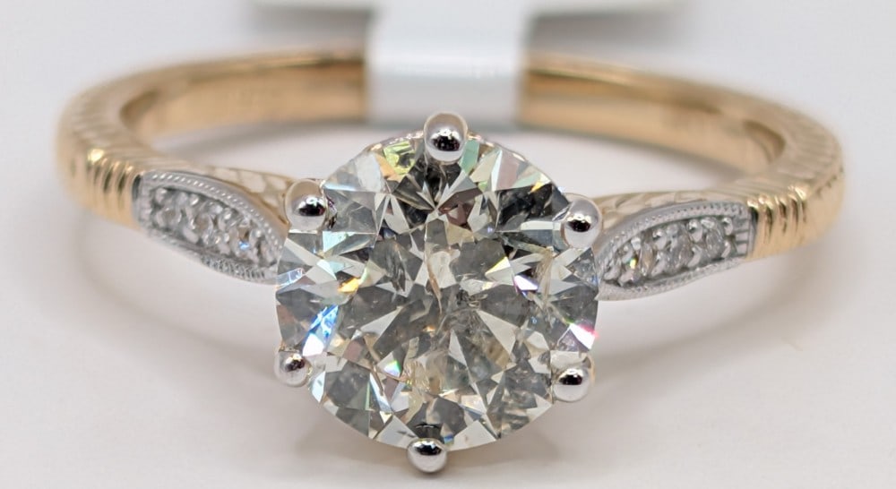 14K Gold Aaron Gofflieb 1.81 Carat Center Diamond Ring: 14K yellow gold designer Aaron Gofflieb diamond ring. Center stone isa round cut 1.81 Carat diamond witha color grade of G and a clarity of I1. The adjacent stones are (20) round cut diamonds with a