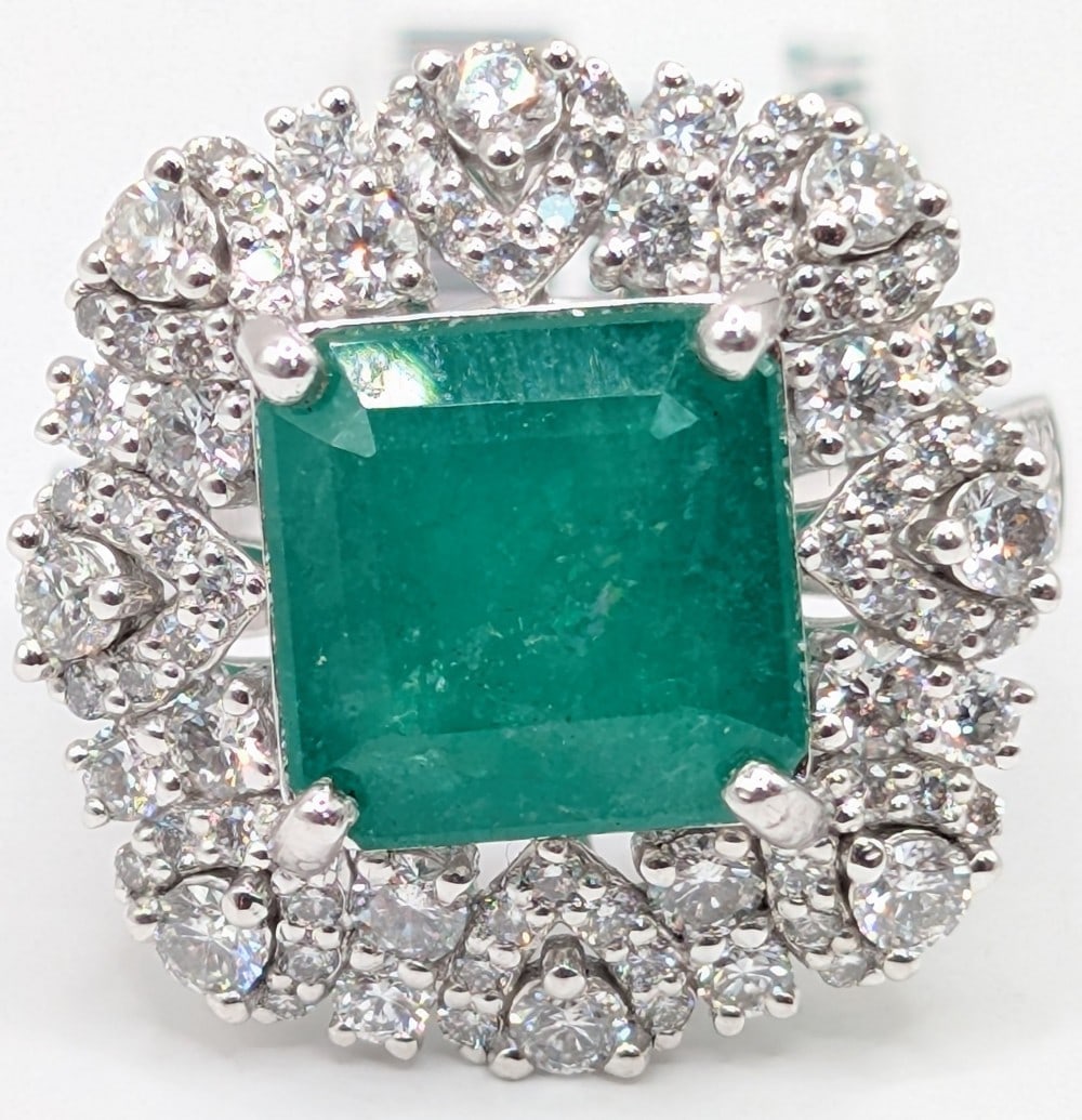 Platinum 4.56 Carat Russian Emerald & Diamond Ring: Platinum ring with 4.56 carat Russian emerald beryl center stone and (162) round cut diamonds with a total carat weight of 1.50. Ring is size 7 and weighs 10.8 grams. The ring comes with a GIA