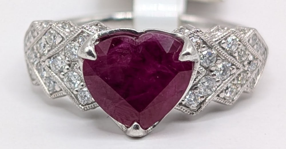 Platinum Oscar Friedman 2.84 Carat Heart Cut Burmese Ruby & Diamond Ring: Platinum ring with heart cut 2.84 carat Burmese Ruby with (62) round cut diamonds with a total carat weight of 0.50. ring is size 7 and weighs 8.2 grams. Ring comes with an AIGL appraisal report and a