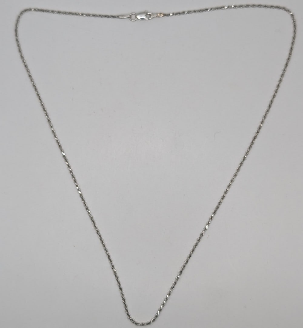 14K Gold Twisted Rope Chain Necklace: 14K white gold twisted rope chain necklace. Measures 18" and weighs 3.9 grams.