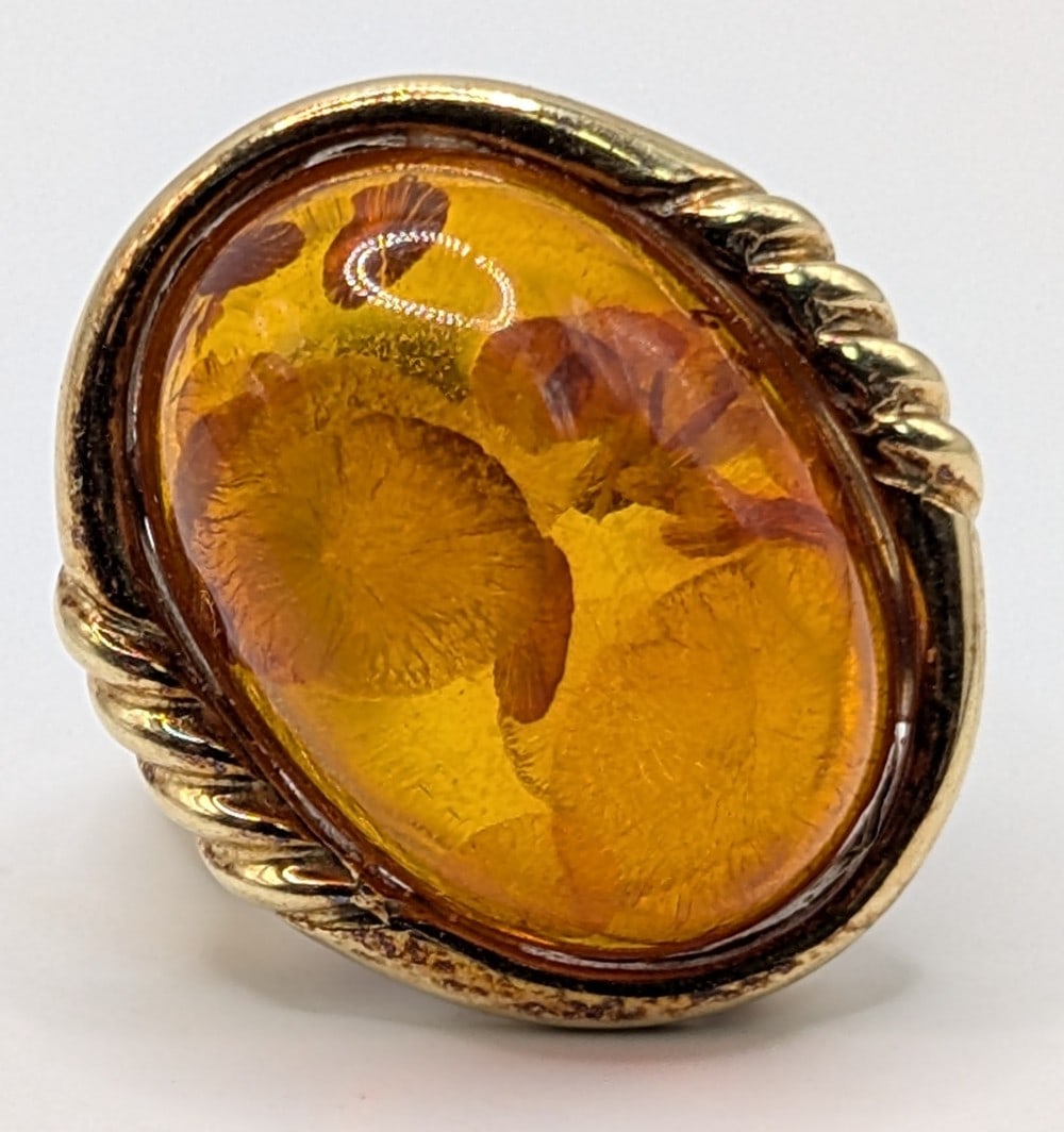 14K Gold Amber Cabochon Ring: Vintage 14K yellow gold ring with oval cabochon amber. Ring is size 4 and weighs 6.5 grams.