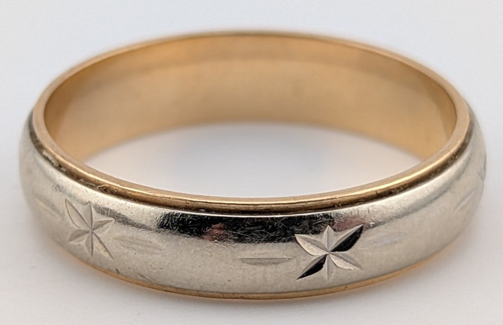 Men's 14K Two Tone Gold Wedding Band: Men's 14K white & yellow gold diamond cut wedding band. Size 12 and weighs 5.6 grams.