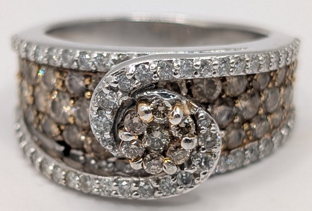 14K Gold White & Chocolate Diamond Swirl: 14K white gold wide band ring with round cut white and chocolate diamonds. Ring is size 7 and weighs 10.8 grams.