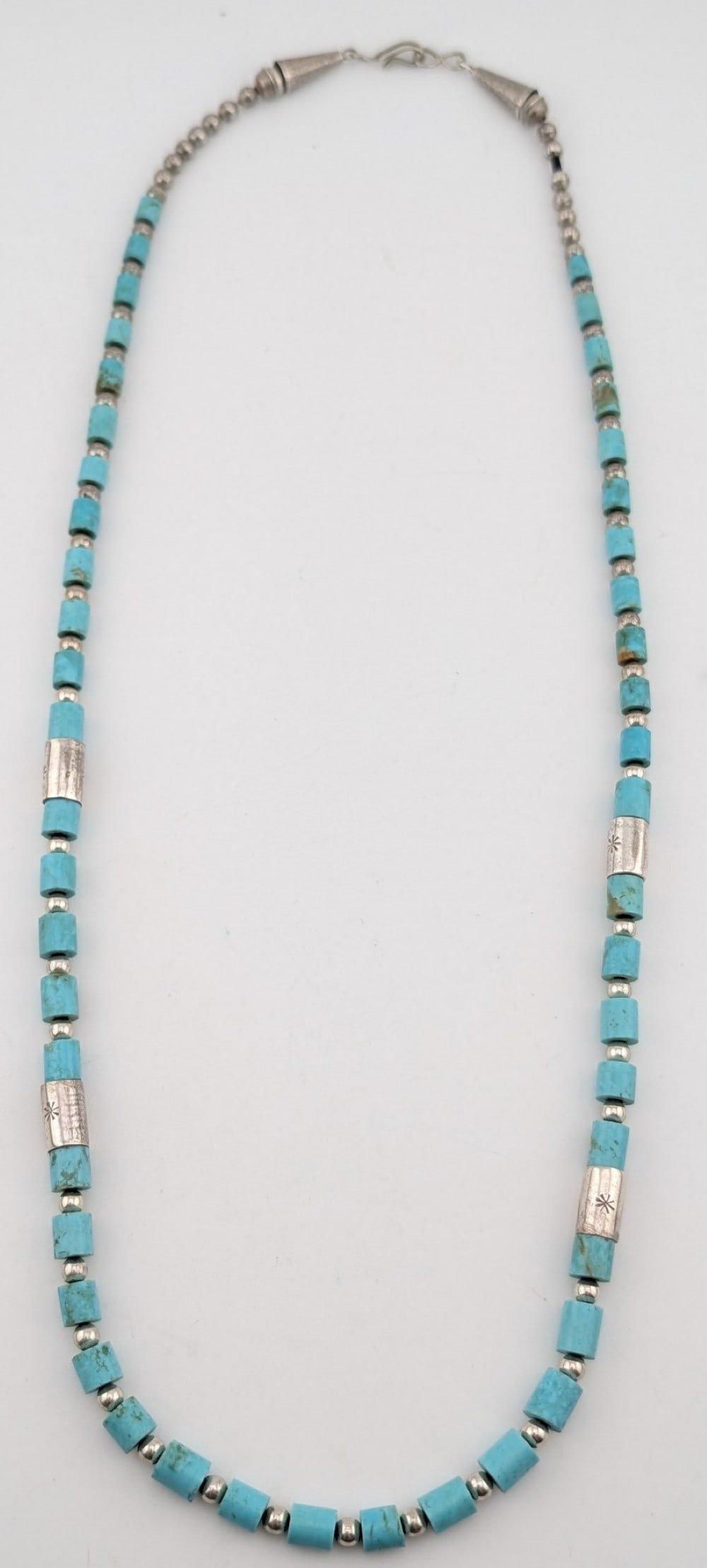Vintage Navajo Sterling & Turquoise Beaded Necklace: Vintage Navajo Sterling silver and turquoise beaded necklace. Measures 22" and weighs 25 grams.