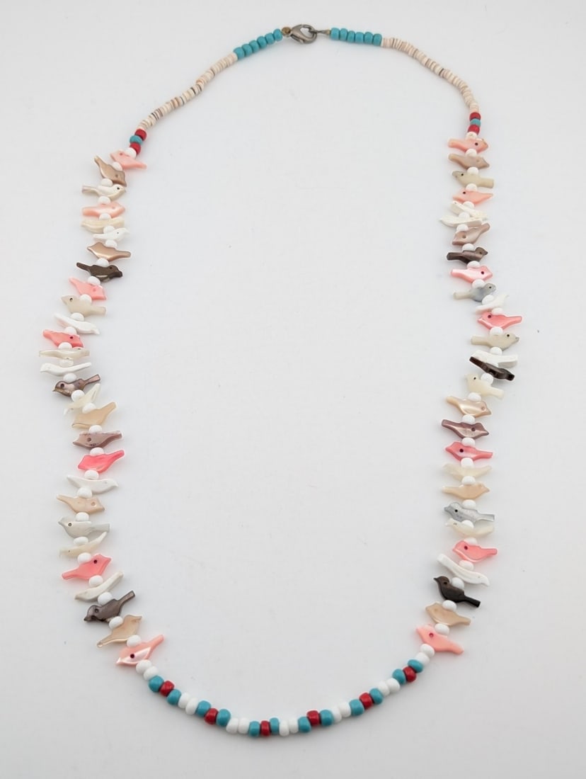 Vintage Heishi Beads & Mother Pearl Bird Fetish Necklace: Vintage Heishi beaded mother of pearl carved bird fetish necklace. Measures "24 inches