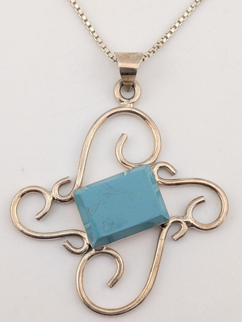 Vintage Sterling Handmade Turquoise Pendant Necklace: Handmade sterling silver necklace with turquoise stone. Pendant is on a 20" sterling silver box chain with a magnetic clasp. Total weight is 24 grams.