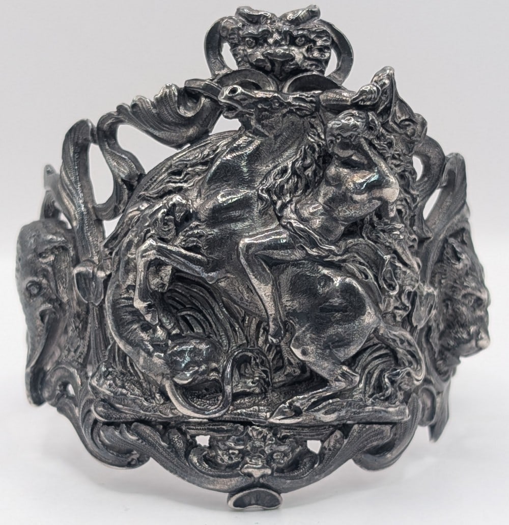 Rare 19th Century Rudolphi Silver High Relief Figural Cuff: Sterling silver cuff by the renowned 19th century Parisian silversmith Fr?d?ric-Jules Rudolphi is a masterpiece of Neo-Renaissance design. The bracelet features an extraordinary high-relief sculptural