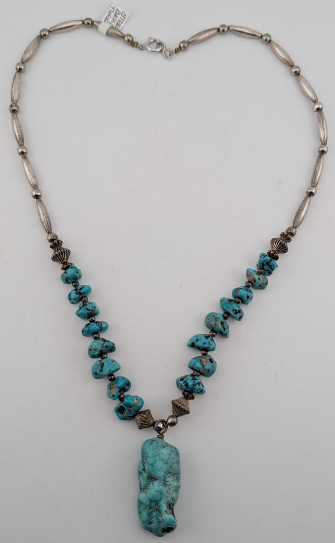 Sterling Southwestern Turquoise Beaded Necklace: Southwestern sterling silver and turquoise beaded necklace. Measures 20"