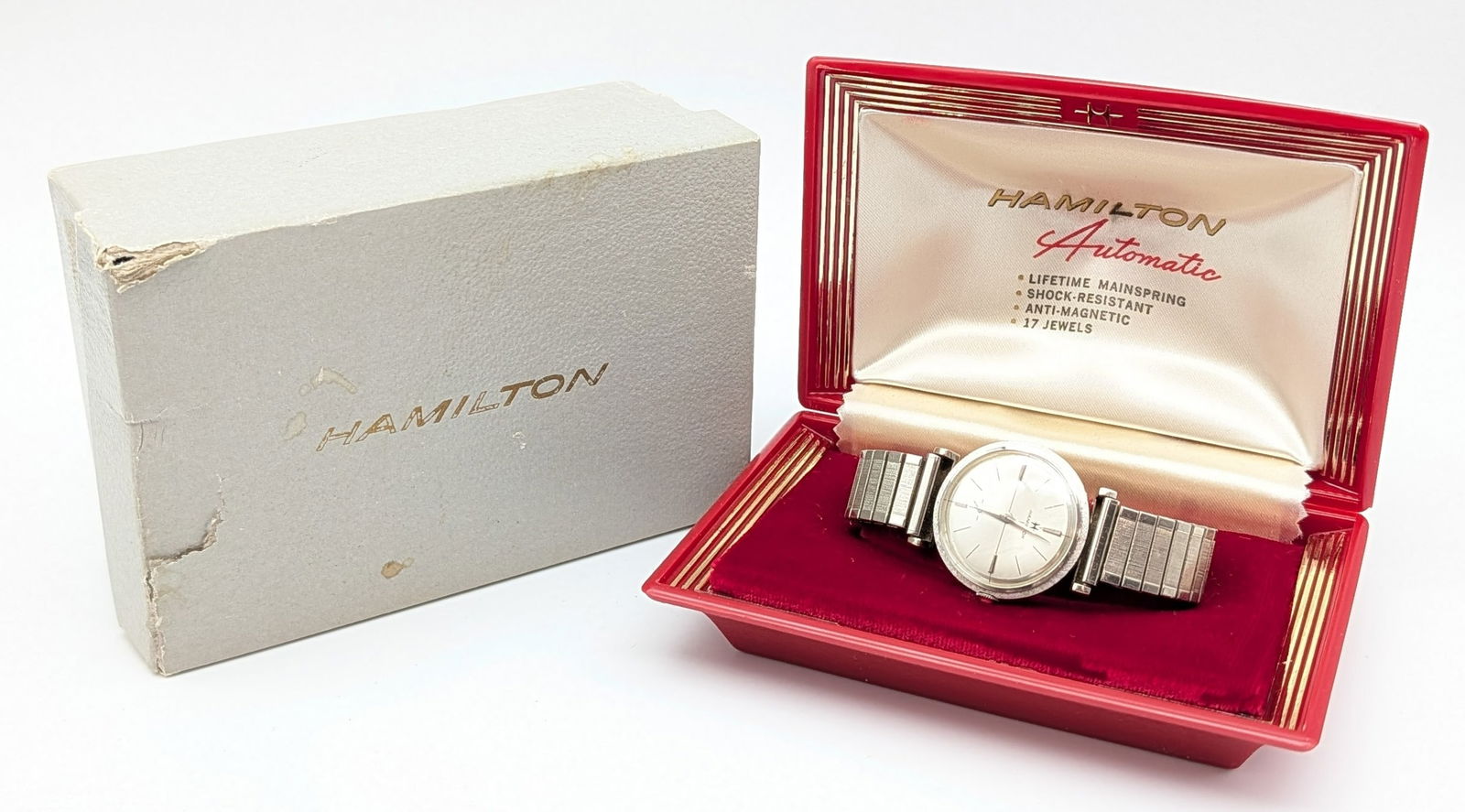 Vintage Hamilton 14k White Gold Men's Wrist Watch w/ Box & Case: Watch features a 14k gold case measuring 32.5mm long x 32.5mm wide, a 17 jewel movement, and a 10k gold filled stretch band. Watch does have scuffs and wear from use, and is currently running.