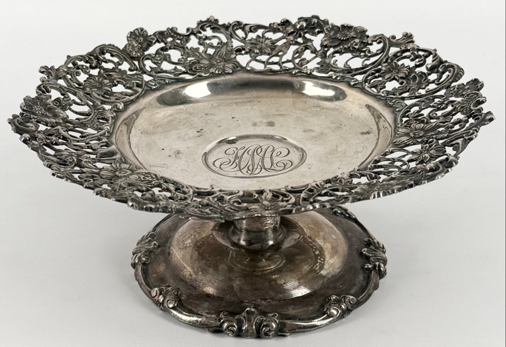 Antique Sterling Silver Theodore B. Starr 7" Compote: Antique Sterling Silver Theodore B. Starr New York Compote. The ornate compote is #1130 and is signed on the base. It displays well and is monogrammed. It measure approximately 3" tall x 7" across x 7