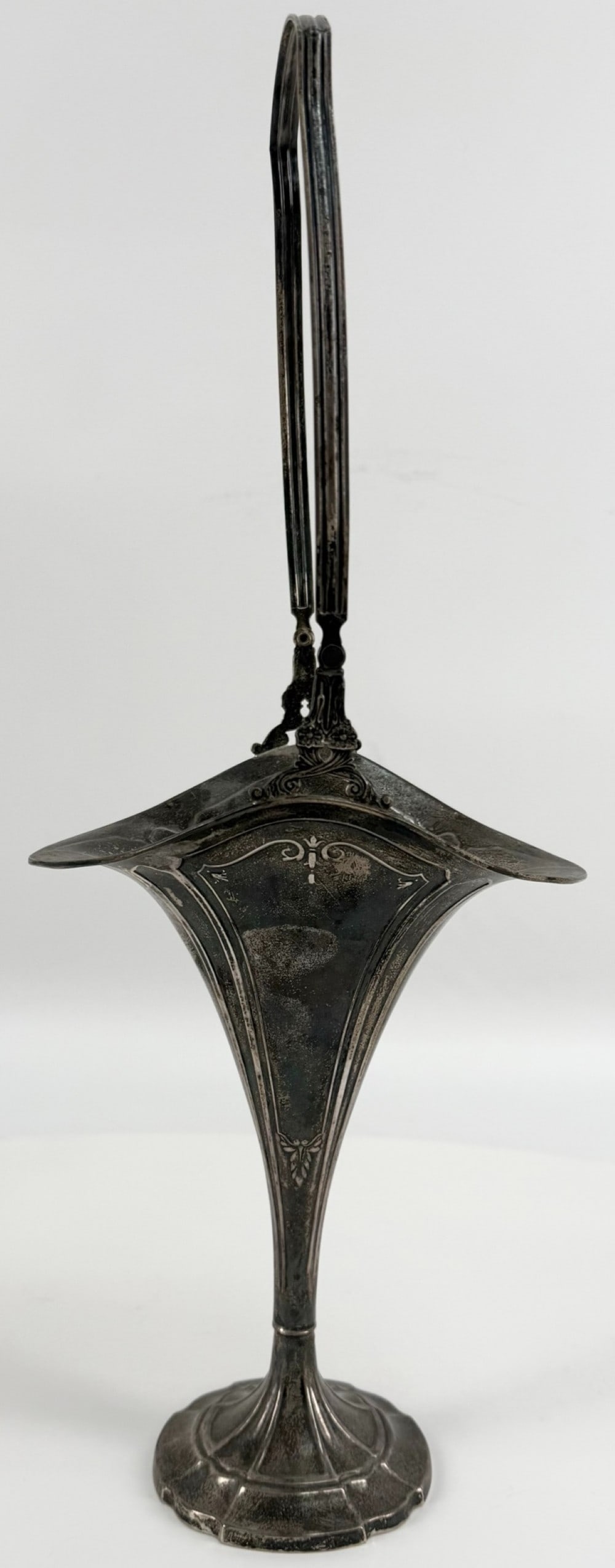 Antique Webster Sterling Silver Tall Handled Brides Basket: Antique Webster Sterling Silver Tall Handled Brides Basket #9824. The basket displays well and is monogrammed on the side. Measures approximately 14" tall with the handle x 9" across x 6-1/4" across x