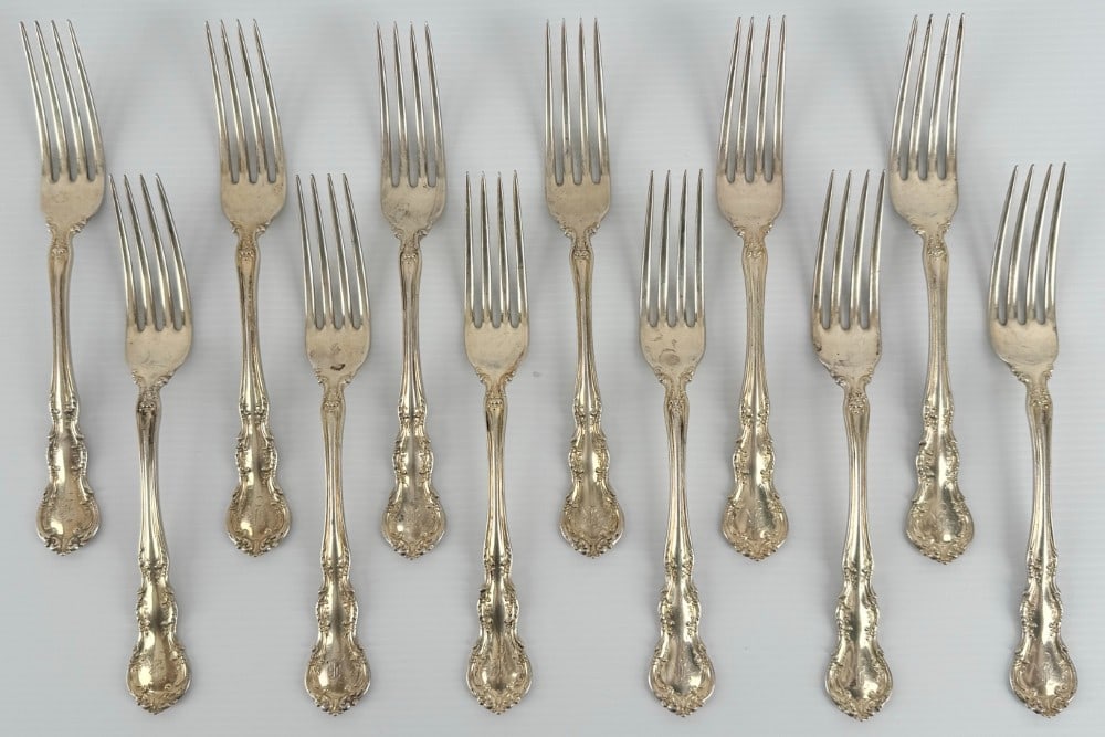 12 Piece Wallace Sterling Silver "Old Atlanta" Place Forks: 12 Piece Wallace Sterling Silver Place Forks in the "Old Atlanta" Pattern. The forks are in good condition with monograms. Total weight is approximately 19.88 troy ounces of sterling silver.