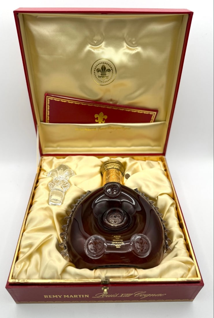 Boxed Baccarat Remy Martin Louis XIII Cognac Decanter: Empty Baccarat Remy Martin Louis XIII Cognac Decanter in the original box with cap and stopper. The decanter is in like new condition with the original inner box, outer box, and paperwork. Carafe No.