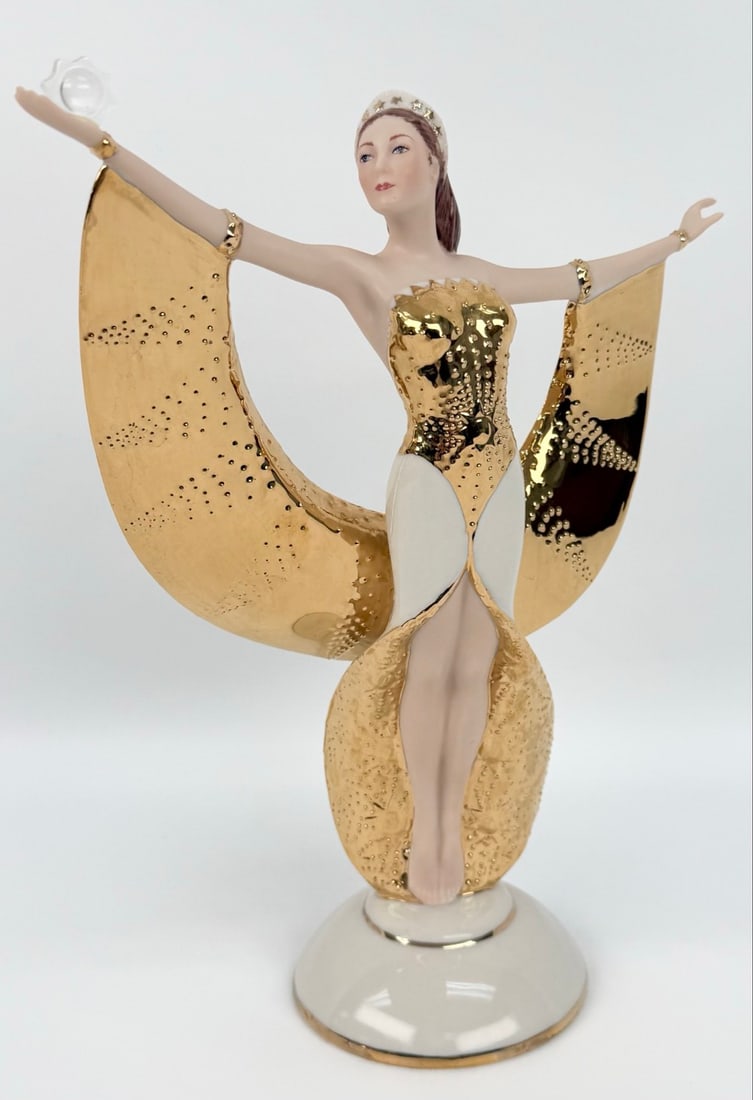 Franklin Mint "Sunrise In Gold" Art Deco Figurine: Beautiful Franklin Mint Fine Porcelain Figurine. The Art Deco figurine is titled "Sunrise In Gold" and has wonderful detail. Great condition with no chips or cracks. Measures approximately 10-3/4" tal