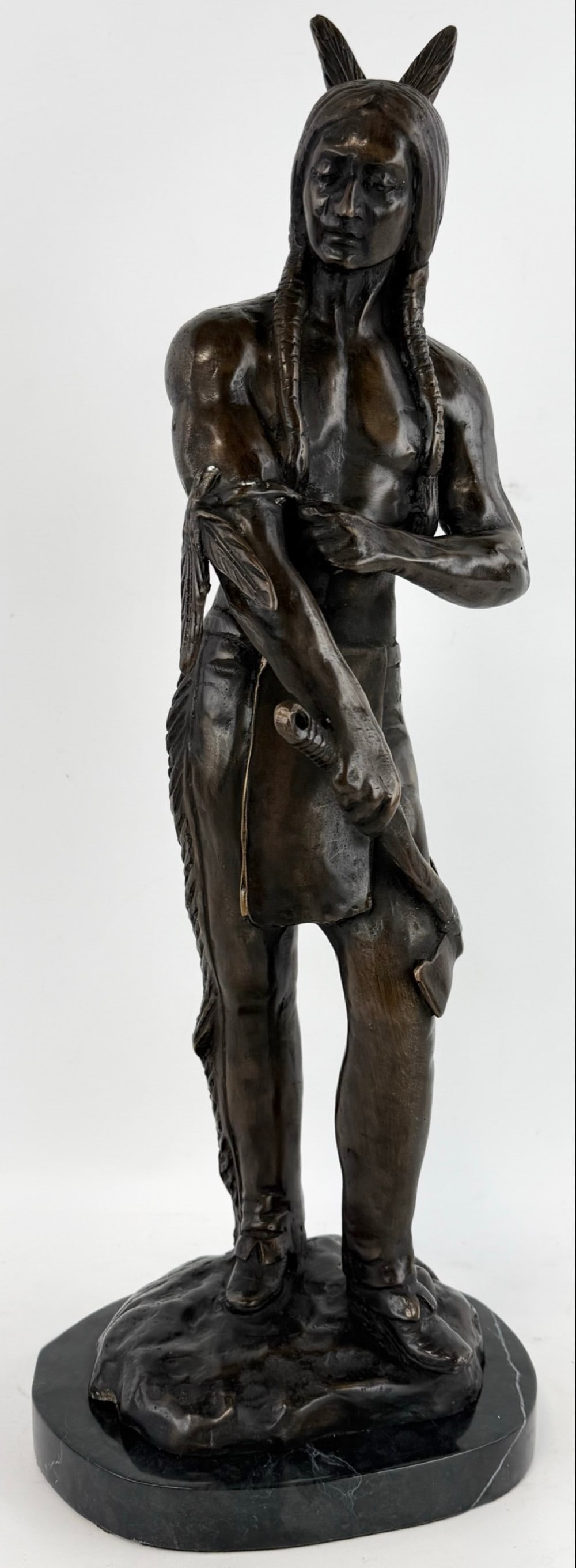 Standing American Indian Brave Bronze Statue: Nicely detailed Standing American Indian Brave bronze statue on a marble base. Measures approximately 22" tall with the base, unsigned.