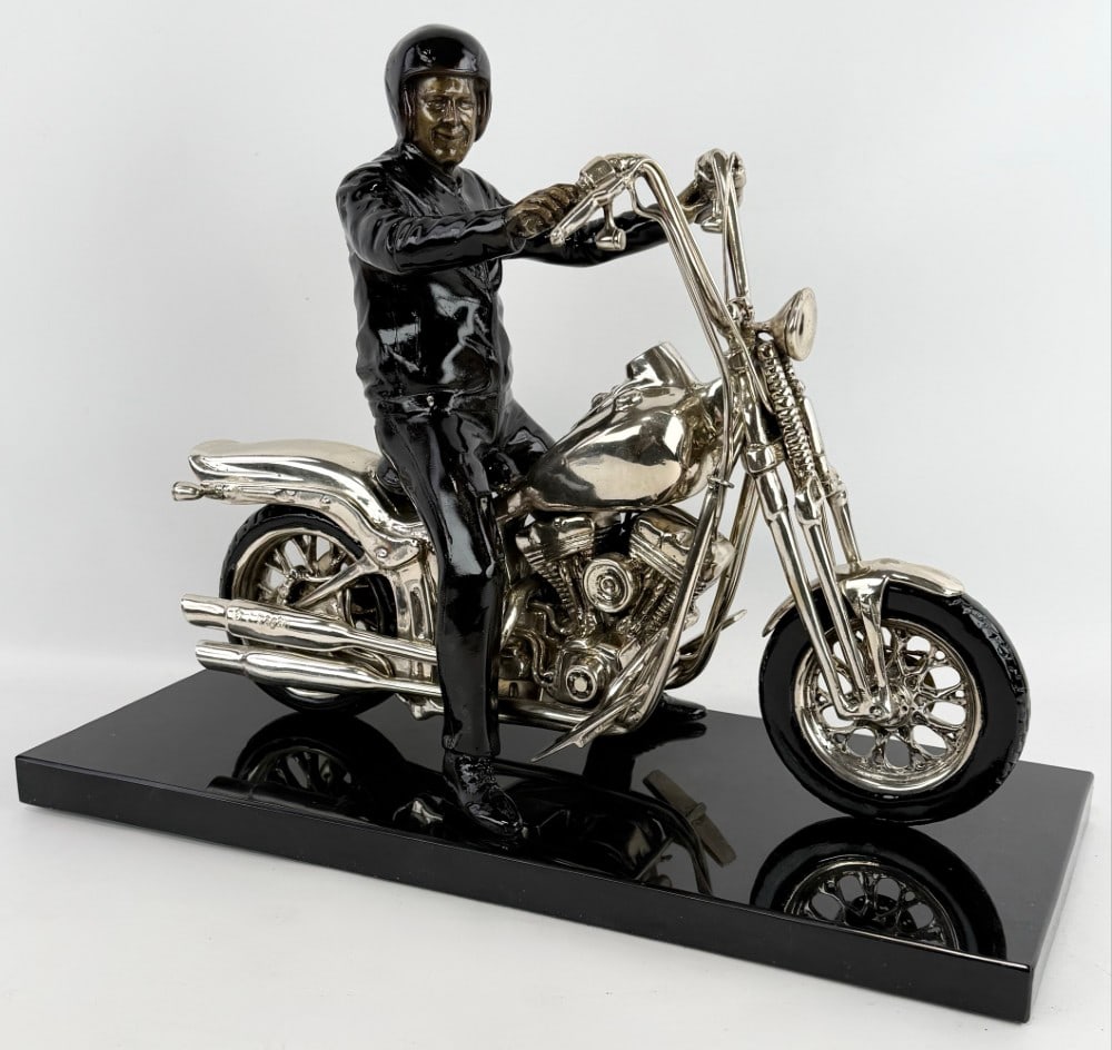 Harley Davidson Motorcycle & Rider Silver-Plated Bronze Sculpture: Harley Davidson Motorcycle & Driver bronze sculpture on a marble base. The sculpture has great detail with silver-plate & colorized details. Measures approximately 15" tall x 19-1/2" across x 8-3/4" d