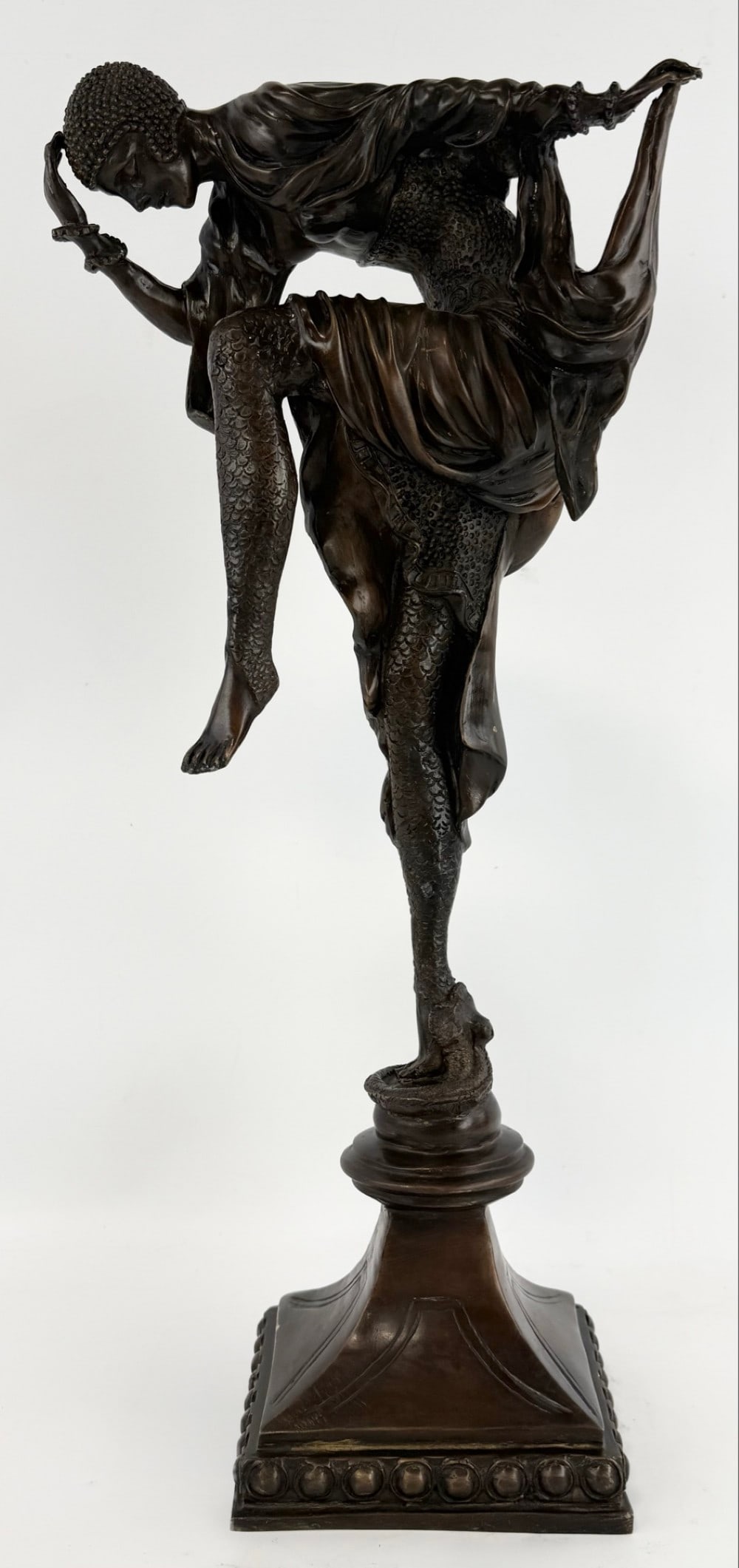 Art Deco Dancer Bronze Sculpture: Art Deco Dancer bronze sculpture. The bronze is in great condition with quality detail. It measure approximately 22-3/4" tall x 10-1/2" across x 6" deep.