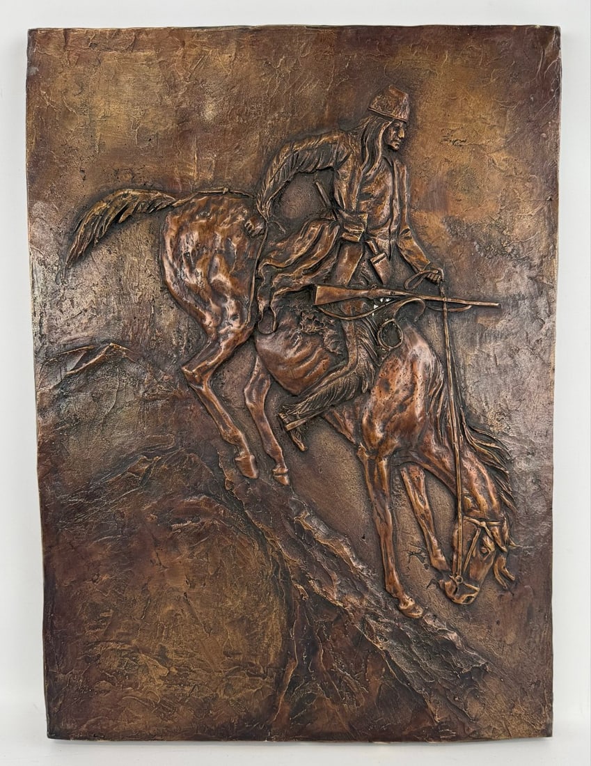 "Mountain Man" Bronze Wall Plaque After Frederic Remington: "Mountain Man" Bronze Wall Plaque After Frederic Remington. The plaque has great detail and quality workmanship. Overall the plaque measures approximately 14" across x 19" tall.