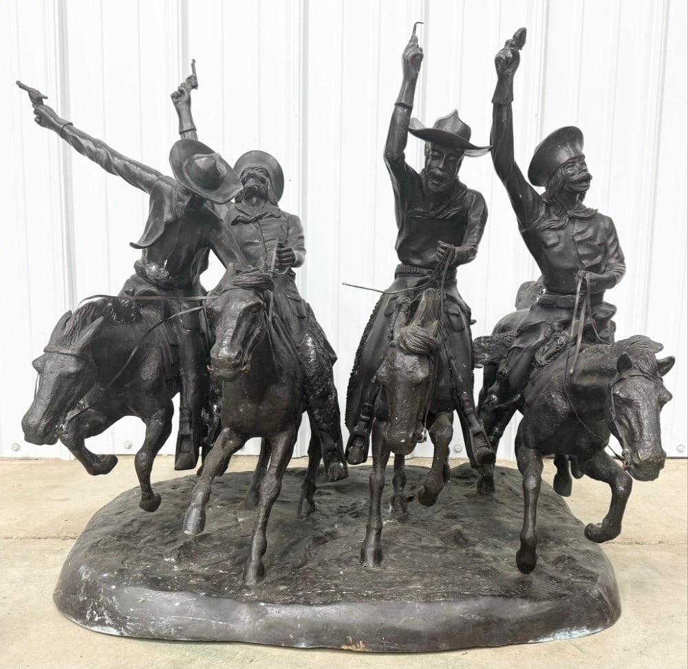After Frederic Remington "Coming Through The Rye" Large Bronze Sculpture: Large bronze statue titled "Coming Through The Rye" After Frederic Remington. The bronze features four cowboys on running horses shooting revolvers and yelling. The bronze displays well, but two of th