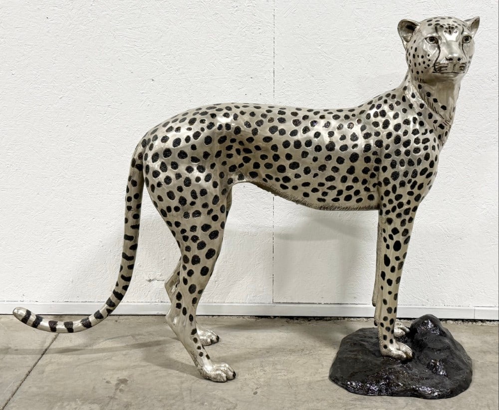 Life Standing Cheetah Silver-Plated Bronze Statue: Life Size Standing Cheetah Silver-Plated Bronze Statue. The statue has great detail and workmanship. Overall the bronze measures approximately 58" across x 44" tall x 17" deep.
