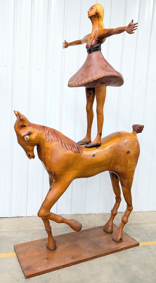 Life-Size Woman Standing On Horse Wood Sculpture By William Harr: Life-Size Woman Standing On Horse Wood Sculpture By William Harr. The horse stands approximately? 63" tall to the top of the ears x 61" across x 15" deep, the woman measures approximately 57" tall x 2