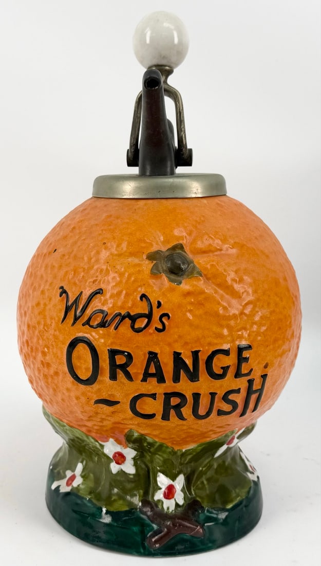 Early 20th Century Ward's Orange Crush Syrup Dispenser: Early 20th Century Ward's Orange Crush Syrup Dispenser. The dispenser is in nice original condition with no chips or cracks. There is a few light paint flakes, displays very well. Comes with the porce