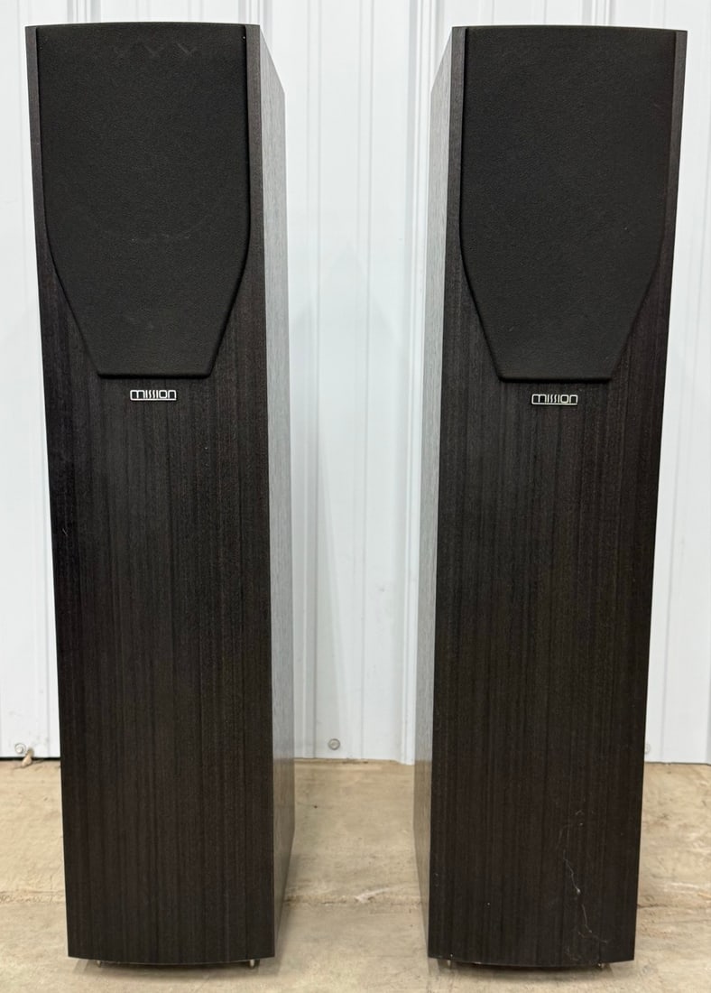 Pair Of Mission M73 2-Way Floor Standing Loudspeakers: Pair Of Mission M73 2-Way Floor Standing Loudspeakers. The speakers feature a 6.3" woofer and a 1" tweeter. They handle 25-100 watts per channel. The have black wood cabinets and are in near new condi