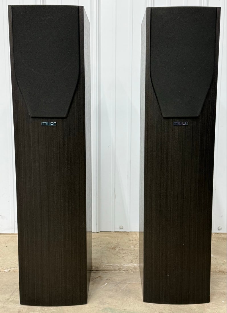 Pair Of Mission M73 2-Way Floor Standing Loudspeakers: Pair Of Mission M73 2-Way Floor Standing Loudspeakers. The speakers feature a 6.3" woofer and a 1" tweeter. They handle 25-100 watts per channel. The have black wood cabinets and are in near new condi