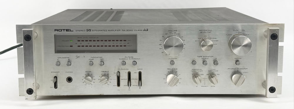 Rotel RA-2040 Stereo Integrated Amplifier: Rotel RA-2040 Stereo Integrated Amplifier. Manufactured in the late 1970's. 120 Watts x 2. The unit powers on and shows some use wear. Measures approximately 5-5/8" tall x 19" across x 17-1/2" deep.