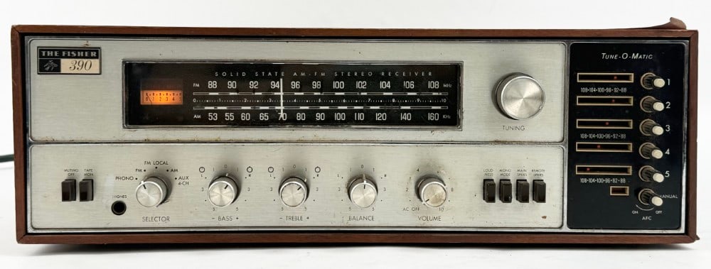 The Fisher 390 2-Channel Solid State AM/FM Receiver: The Fisher 390 2-Channel Solid State AM/FM Receiver. 40 Watts x 2 Channels. Manufactured in the early 1970's. The unit powers-up and shows age and use wear. Measures approximately 5-1/4" tall x 16" ac