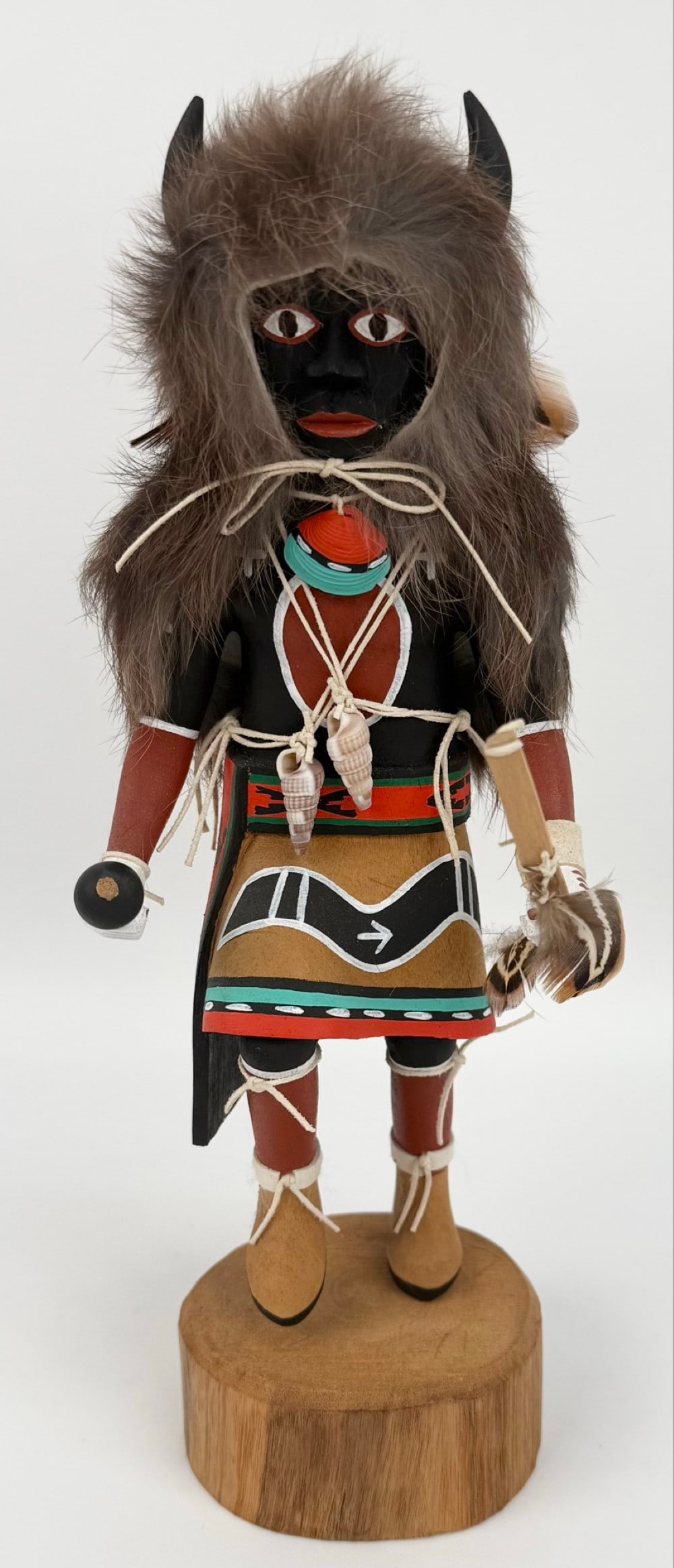 Signed Earl Yowytewa "Black Bear" Hopi Kachina Doll: Hopi Pueblo Kachina Doll by listed artist Earl Yowytewa (1923-2006). The Kachina is titled "Black Bear" and has great detail including shells and feathers. Good condition with no visible damage and br