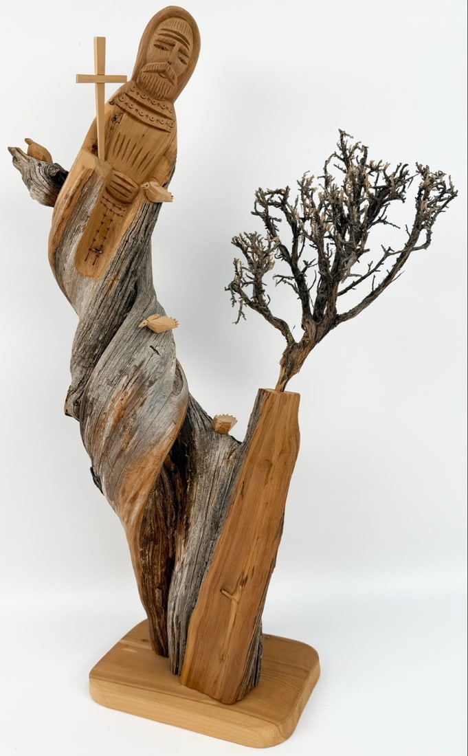 St. Francis Holding A Cross By Tree Santos Cedar Wood Carving By Taos Artist John Tollardo: St. Francis Holding A Cross By A Tree Wood Carving by Taos New Mexico artist John Tollardo. The folk artist uses native cedar sourced from Taos New Mexico and hand-carves his Santos statues. Good cond
