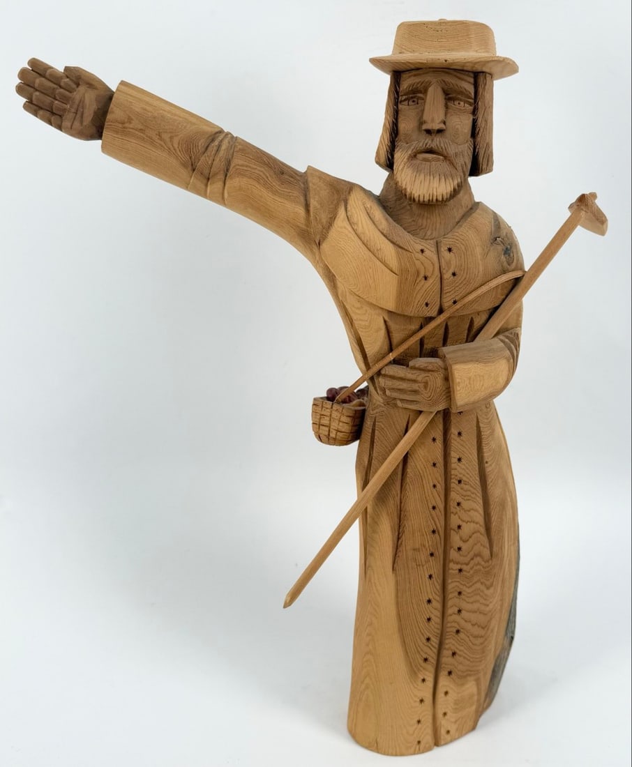 1993 Leonardo Salazar "St. Francis With Hoe & Gathering Basket" Hand-Carved Cedar Wood Figure: Hand-carved cedar wood figure by award winning Taos New Mexico artist Leonardo Salazar. The figure features "St. Francis With A Hoe & Gathering Basket, Out Stretched Arm" and is signed and dated on th