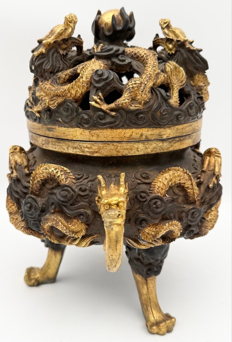 Chinese Gilt Bronze Dragon Incense Burner Censor: Chinese Gilt Bronze Dragon Incense Burner Censor. The piece has intricate detail with some age and display wear, has some green patina areas. Measures approximately 10" tall x 10-1/2" across x 7-1/2"