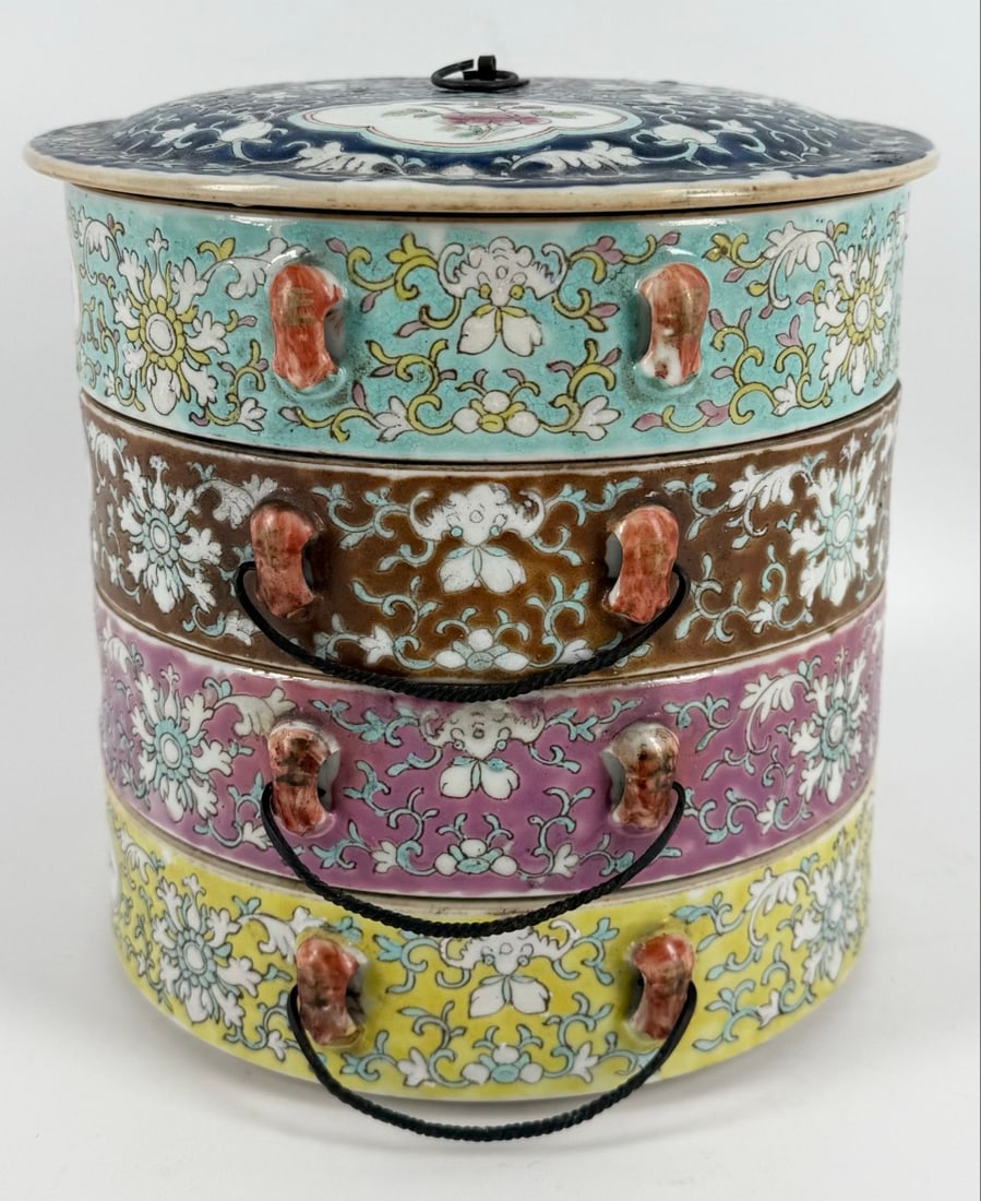 Antique Straits Chinese Porcelain Teng-Kat Stacking Food Container: Antique Chinese Straits Porcelain Teng-Kat Stacking Food Container. Has four colored sections with a domed lid and wire handles, one handle is missing. Displays well with scrolling leaf work and flowe