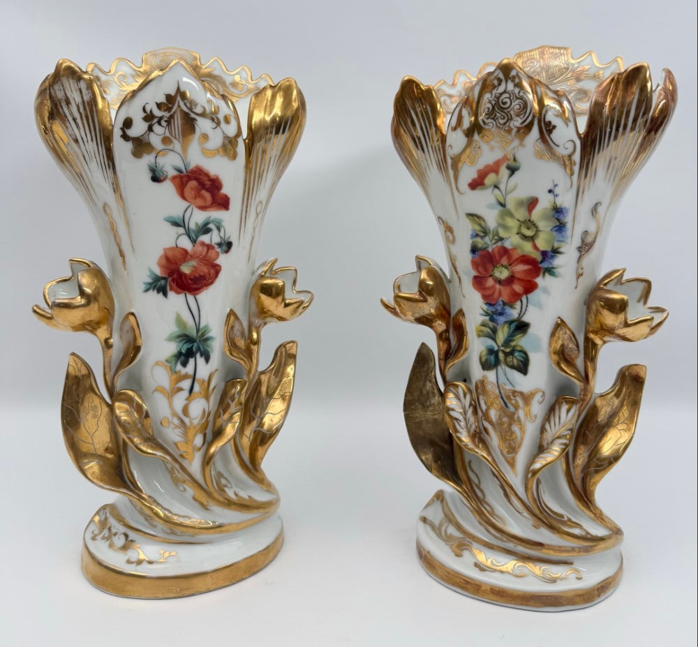 Pair Of Antique French Old Paris Porcelain Flower Vases: Pair Of Antique French Old Paris Porcelain Hand-Painted Flower Vases. The Rococo-inspired vases feature flowers and leaves. One vase is in good condition and one has had a repair to a leaf, they have