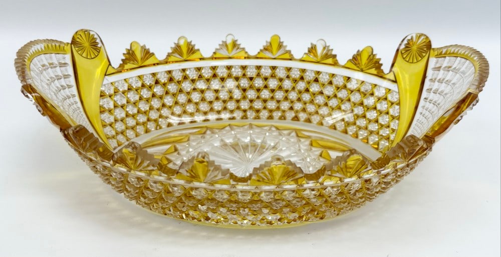 Antique American Brilliant Cut Oval Bowl With Yellow Accents: Antique American Brilliant Cut Oval Bowl With Yellow Accents. The bowl displays very well with quality cutting. It is in good condition with some small flea bites on a few high spots. Measures approxi
