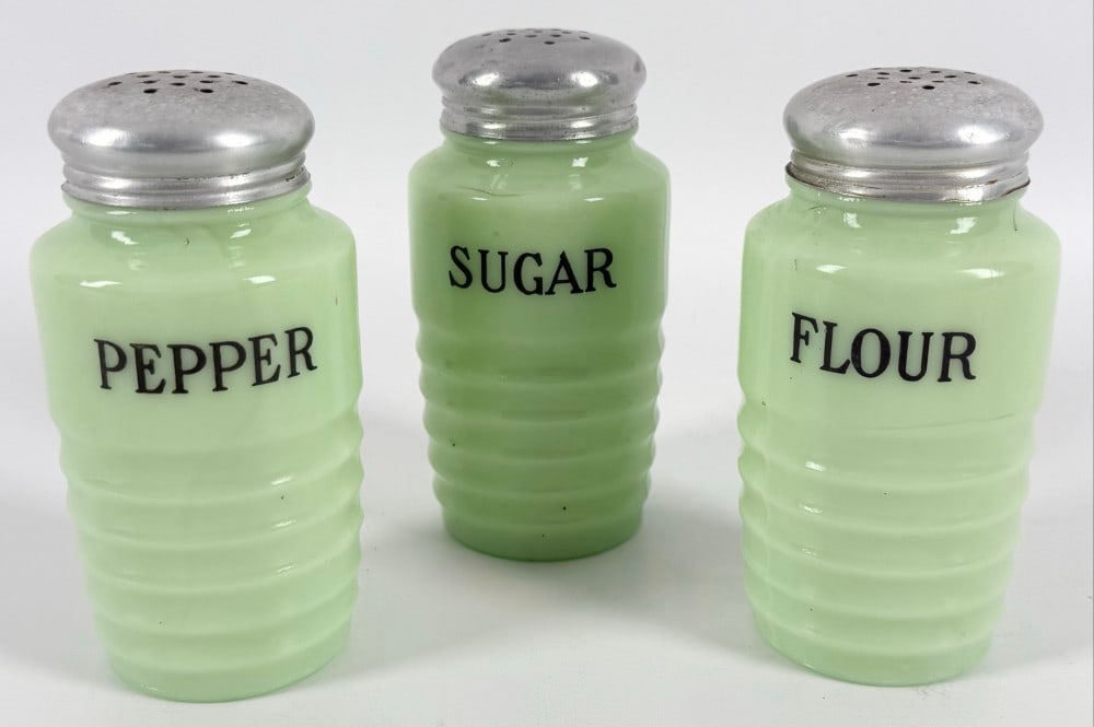Vintage Jeanette 3 Piece Jadeite Beehive Pattern Shaker Set: Vintage Jeanette Jadeite 3 Piece Beehive Pattern Shaker Set. Set includes Pepper, Flour, and Sugar. Nice condition set with the lids. Each piece measures approximately 4-3/4" tall with a diameter of 2