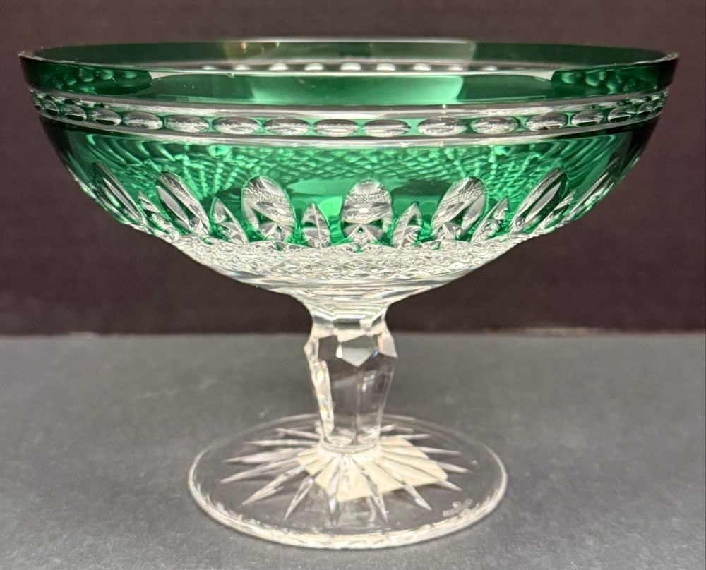 New In Box Waterford Crystal Emerald Compote: Waterford Crystal Emerald Compote. The compote is in new unused condition with the sticker in the original box. Measures approximately 4-1/2" tall x 6-1/4" across.