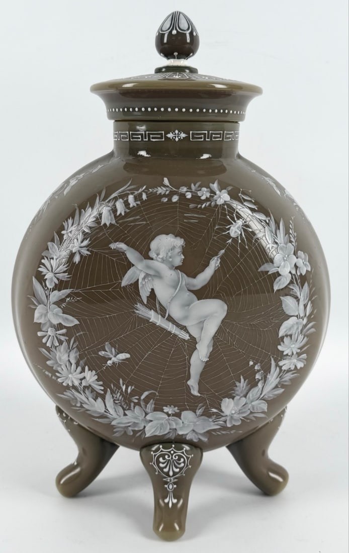 Antique Opaline Footed & Lidded Moon Jar With Cherub Caught In Spider Web: Antique Opaline Footed & Lidded Moon Jar With Cherub Caught In Spider Web. The jar is in wonderful condition with no chips or cracks. Beautiful hand-painted enamel decoration. Measures approximately 1