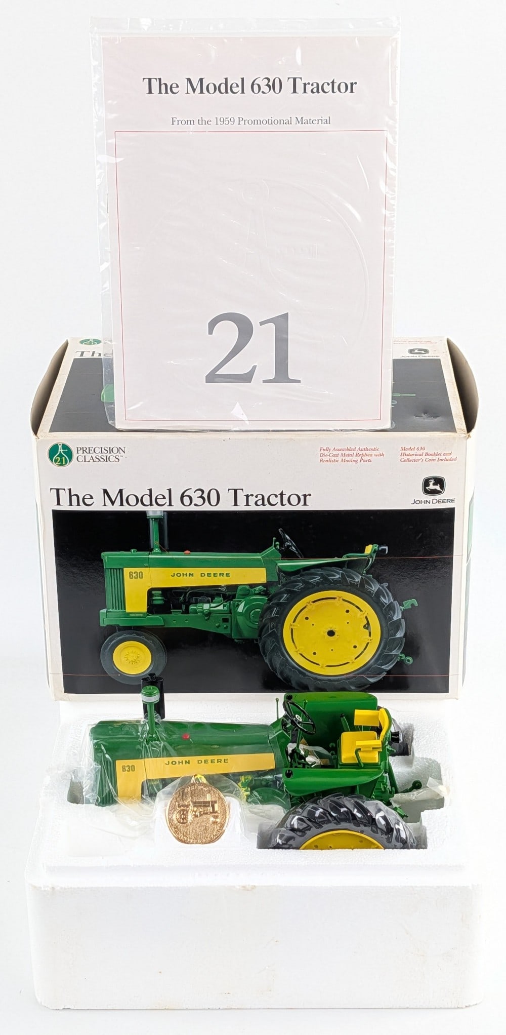 1/16 Ertl John Deere Model 630 Tractor Precision Classics #21: 1/16 Ertl John Deere Model 630 narrow front tractor. Precision Classics Series #21. Good condition in the box and highly detailed. Comes with the historical booklet and collector's coin.