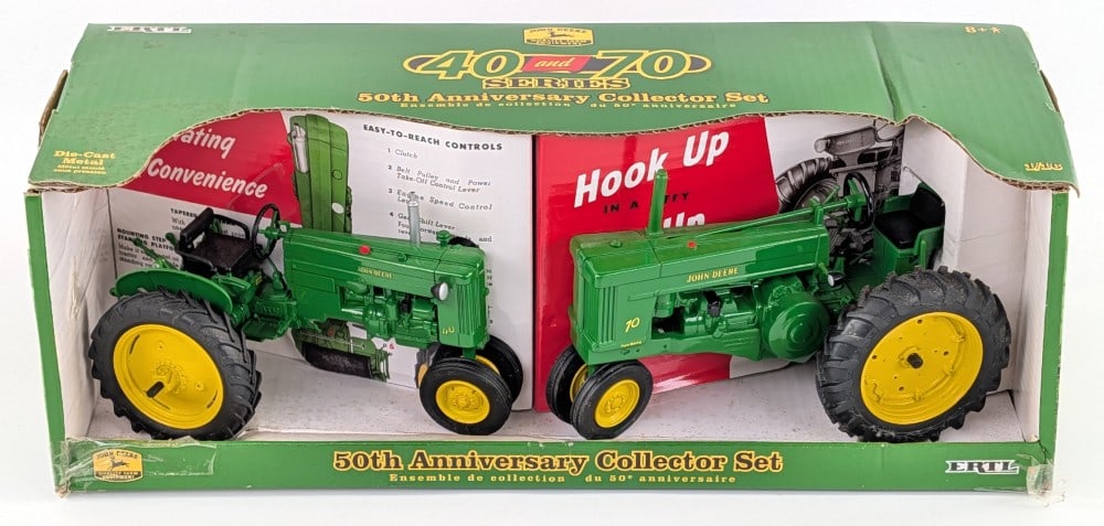 1/16 Ertl John Deere 40 and 70 Tractor 50th Anniversary Set: 1/16 Ertl John Deere 40 and 70 narrow front tractor. 50th Anniversary Collector Set. The tractors are in good condition in the box. It shows some light dust from storage / display.