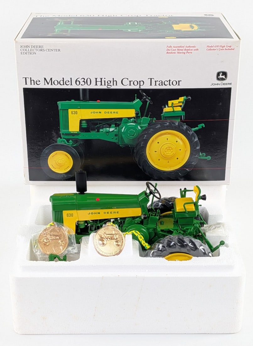 1/16 Ertl John Deere Model 630 High Crop Tractor Collector's Center Series #1: 1/16 Ertl John Deere Model 630 High Crop Tractor Collector's Center Series #1. Good condition new in the box. The tractor comes with both medallions.
