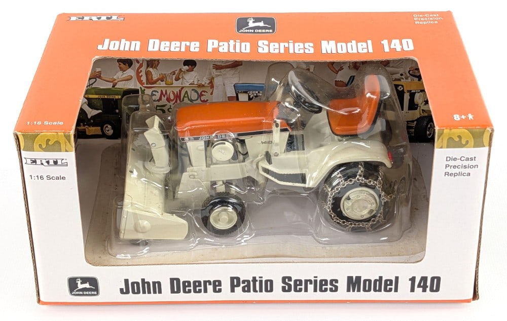 1/16 Ertl John Deere Patio Series Model 140 LGT Sunset Orange: 1/16 Ertl John Deere Patio Series Model 140 Sunset Orange Garden Tractor with snowblower, tire chains, and rear weights. Good condition new in the box and highly detailed. Box has minor dust from stor
