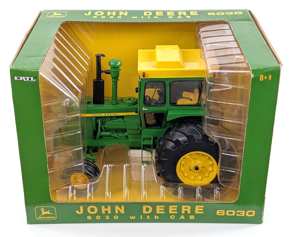 1/16 Ertl John Deere 6030 Tractor with Cab 2004 Plow City Show: 1/16 Ertl John Deere 6030 tractor with cab. 2004 Plow City Farm Toy Show Edition. Good condition in the box.